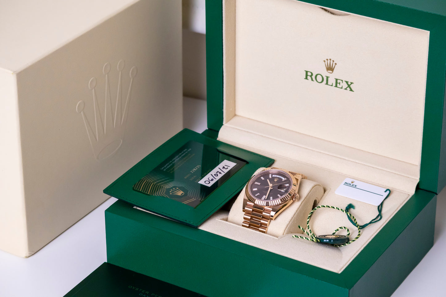 Rolex Day-Date 40mm Rose Gold Chocolate Baguette Diamond Reference 228235